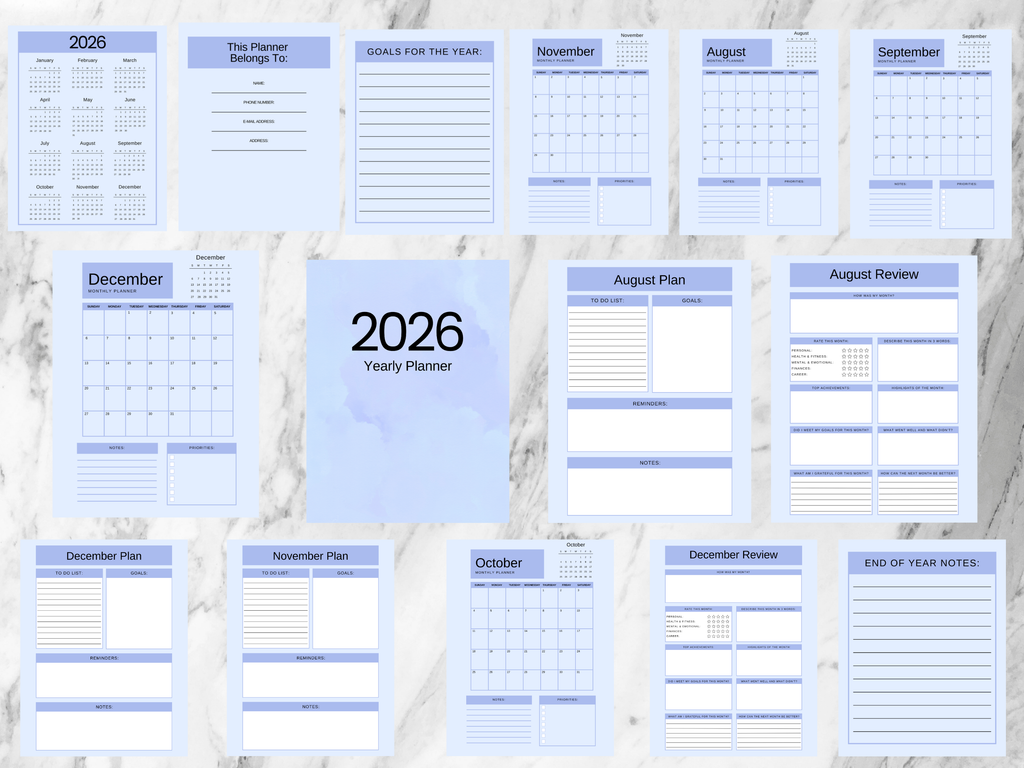Collection of 2026 yearly planner pages on a textured surface