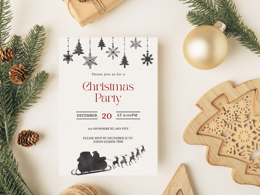 Christmas party invitation with festive decorations on a white surface