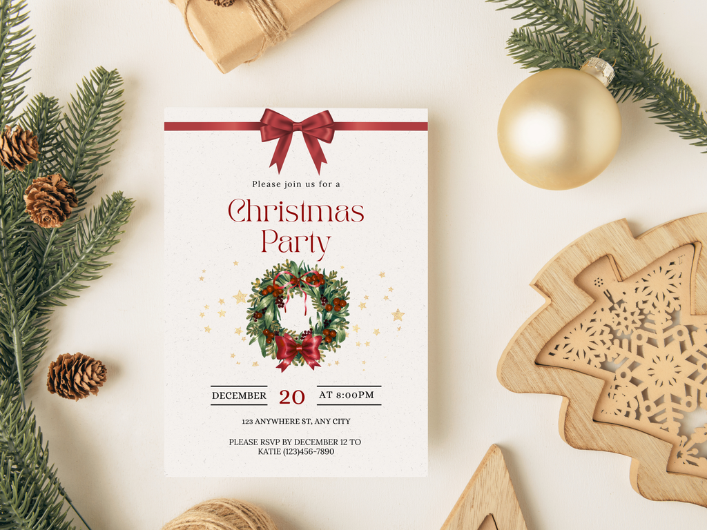 Christmas party invitation with festive decorations on a white surface