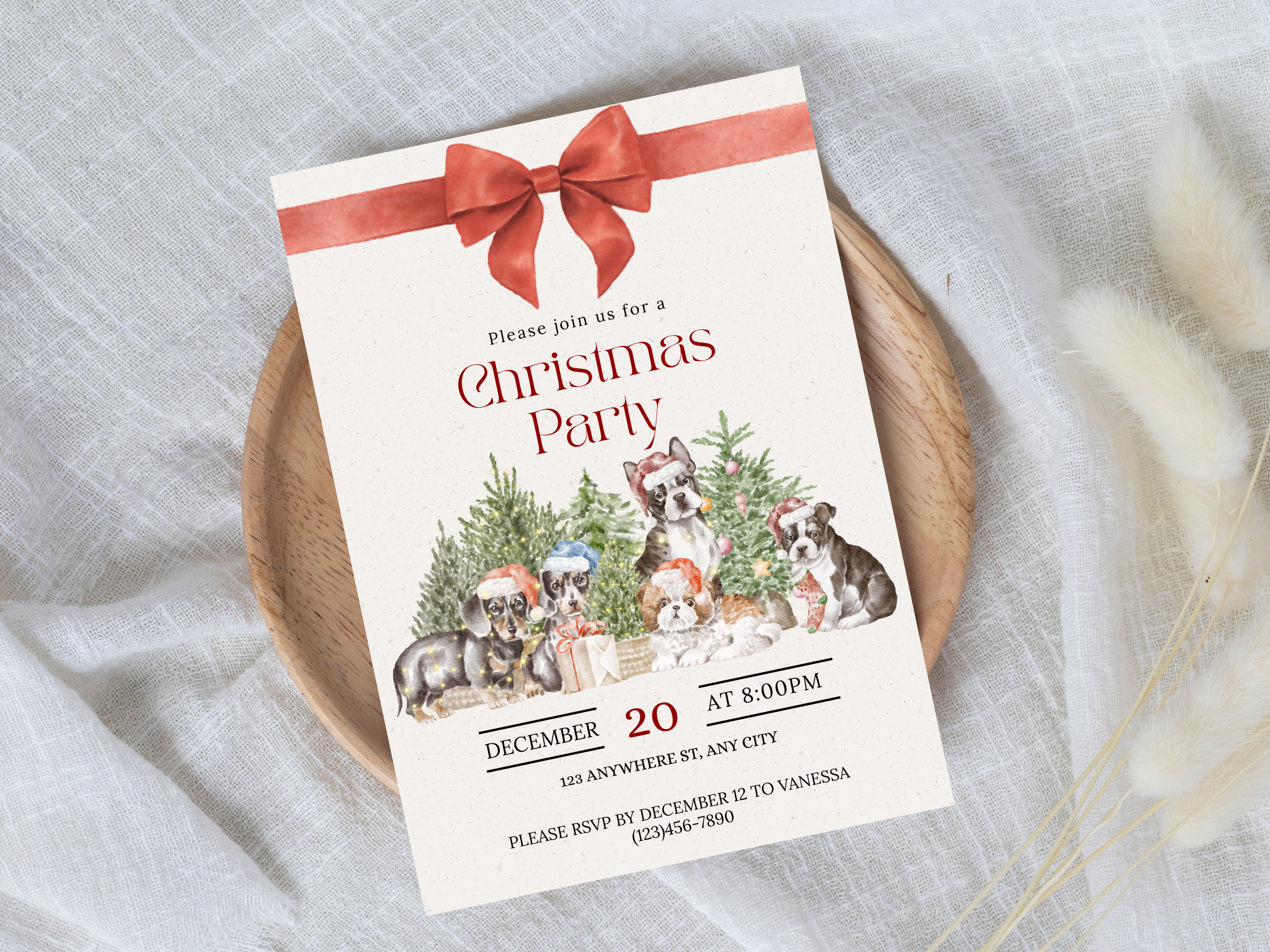 Christmas party invitation with dogs and a bow on a textured surface