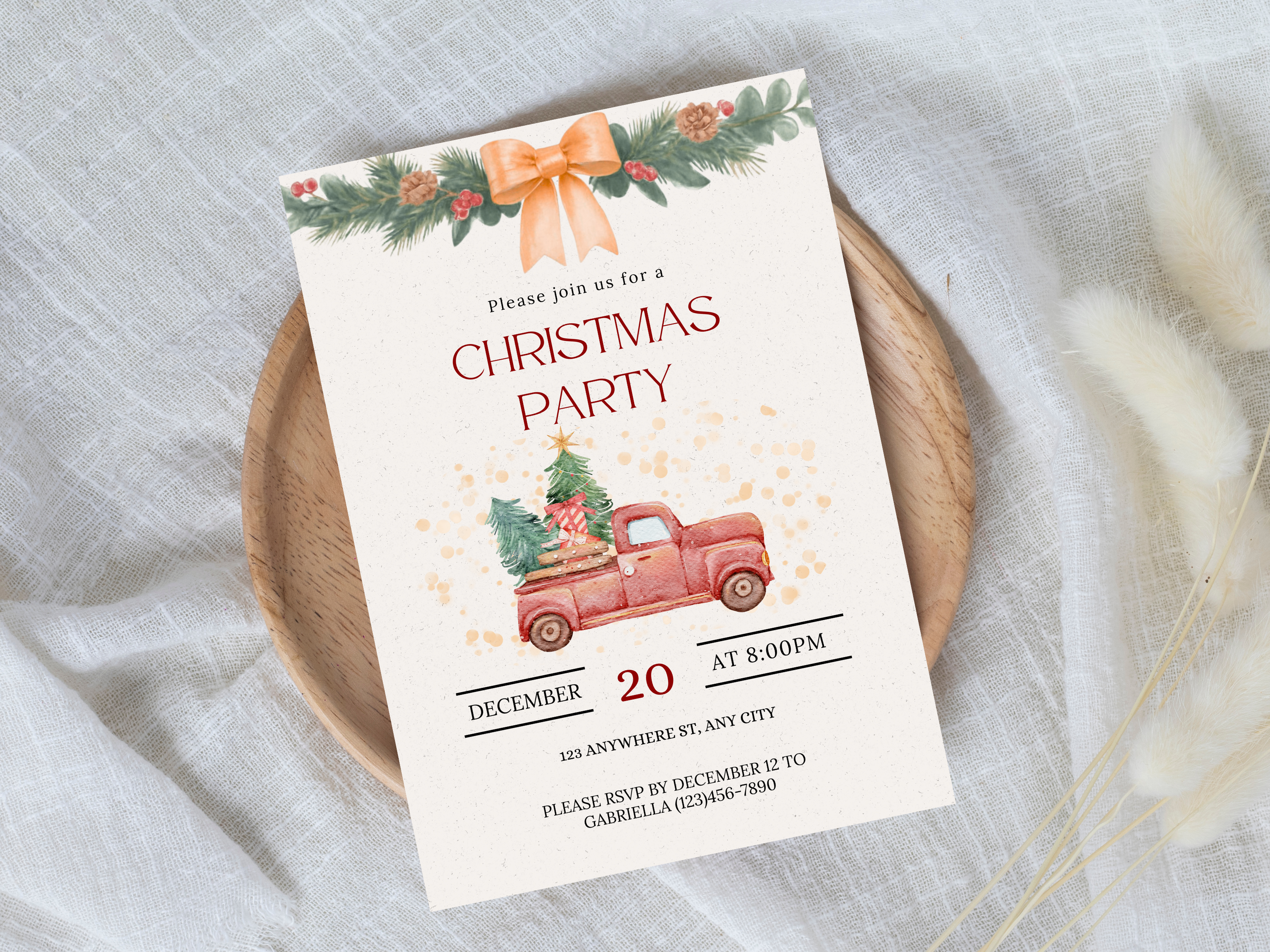 Christmas party invitation with a red truck and bow on a white background