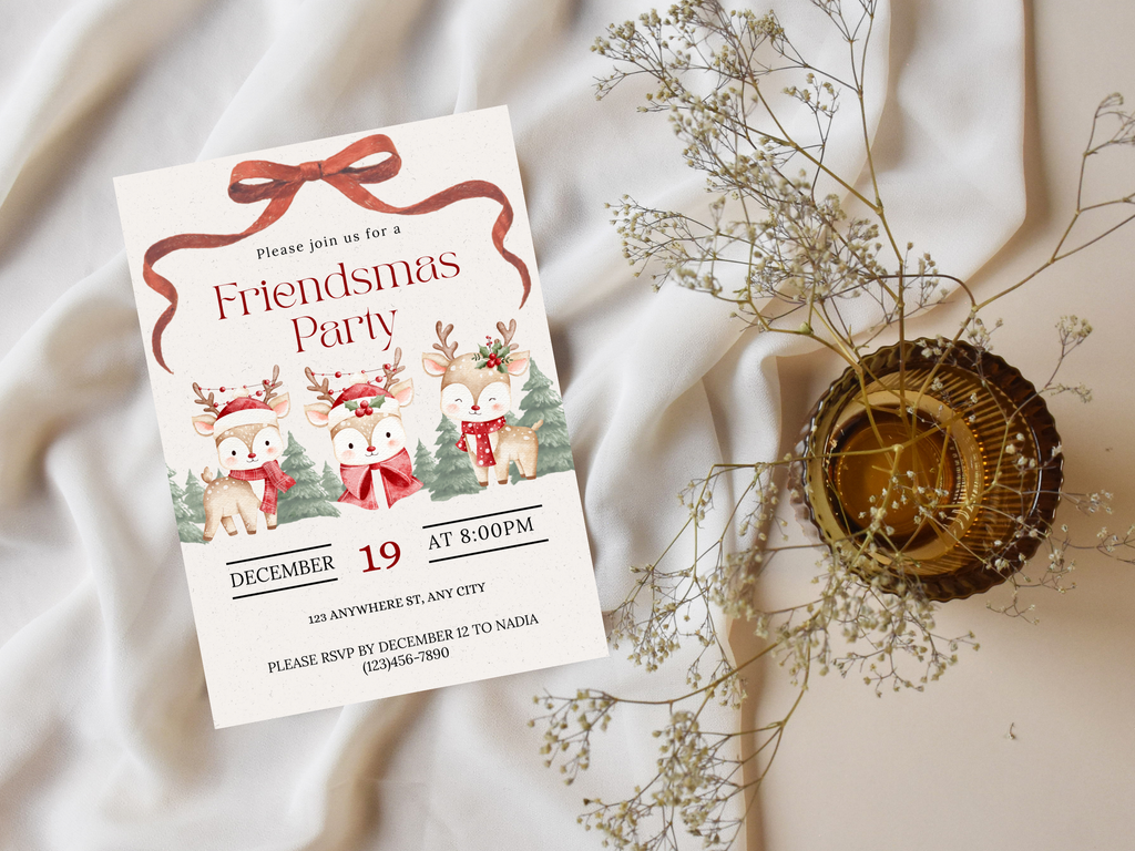 Invitation card for a 'Friendsmas Party' with reindeer graphics on a soft fabric background.