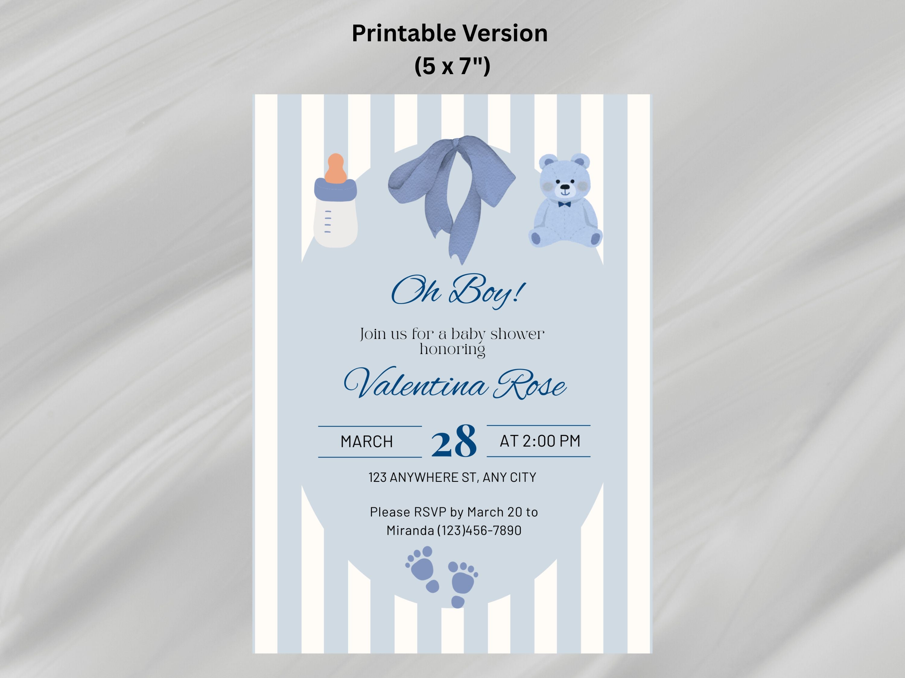 Baby shower invitation with blue and gray design on a striped background