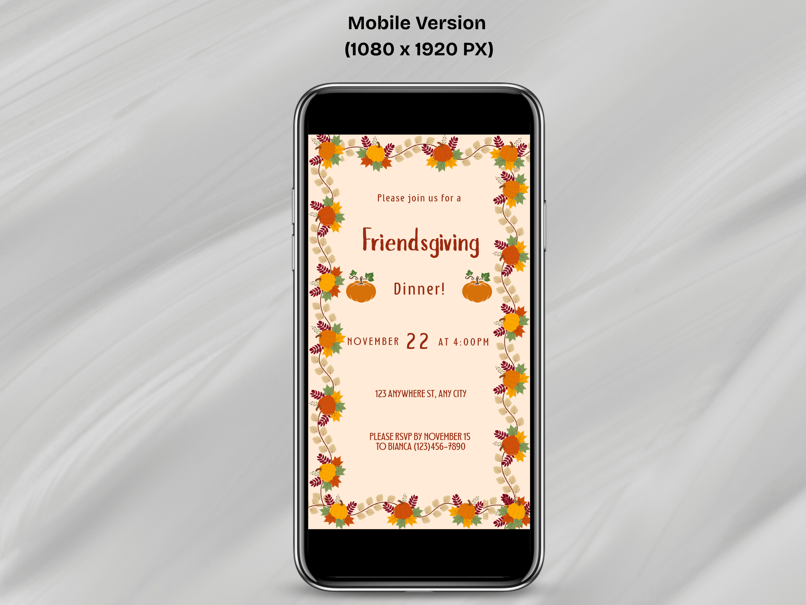 Phone displaying a Friendsgiving dinner invitation on a gray fabric background