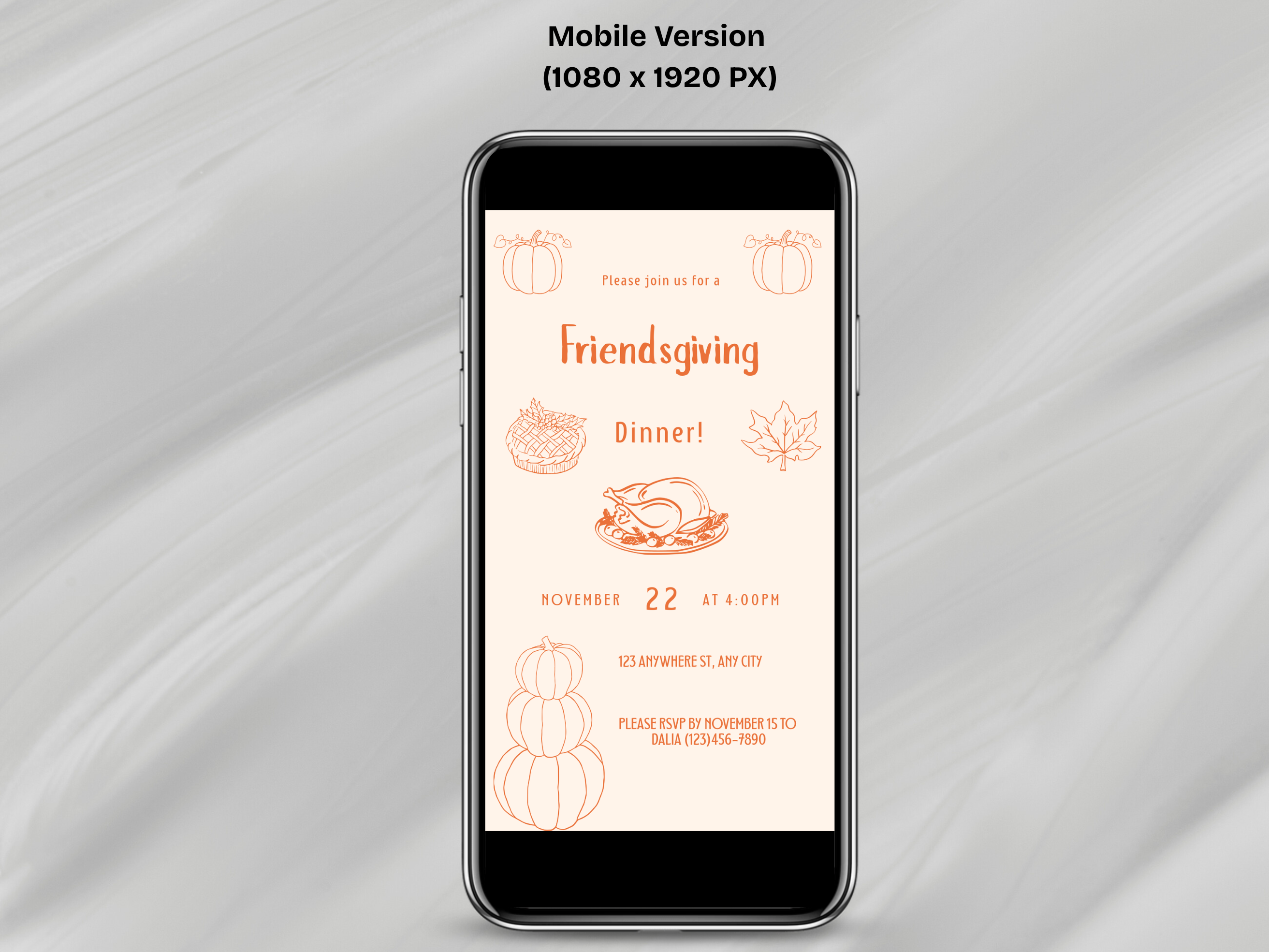 Phone displaying a Friendsgiving dinner invitation on a gray fabric background