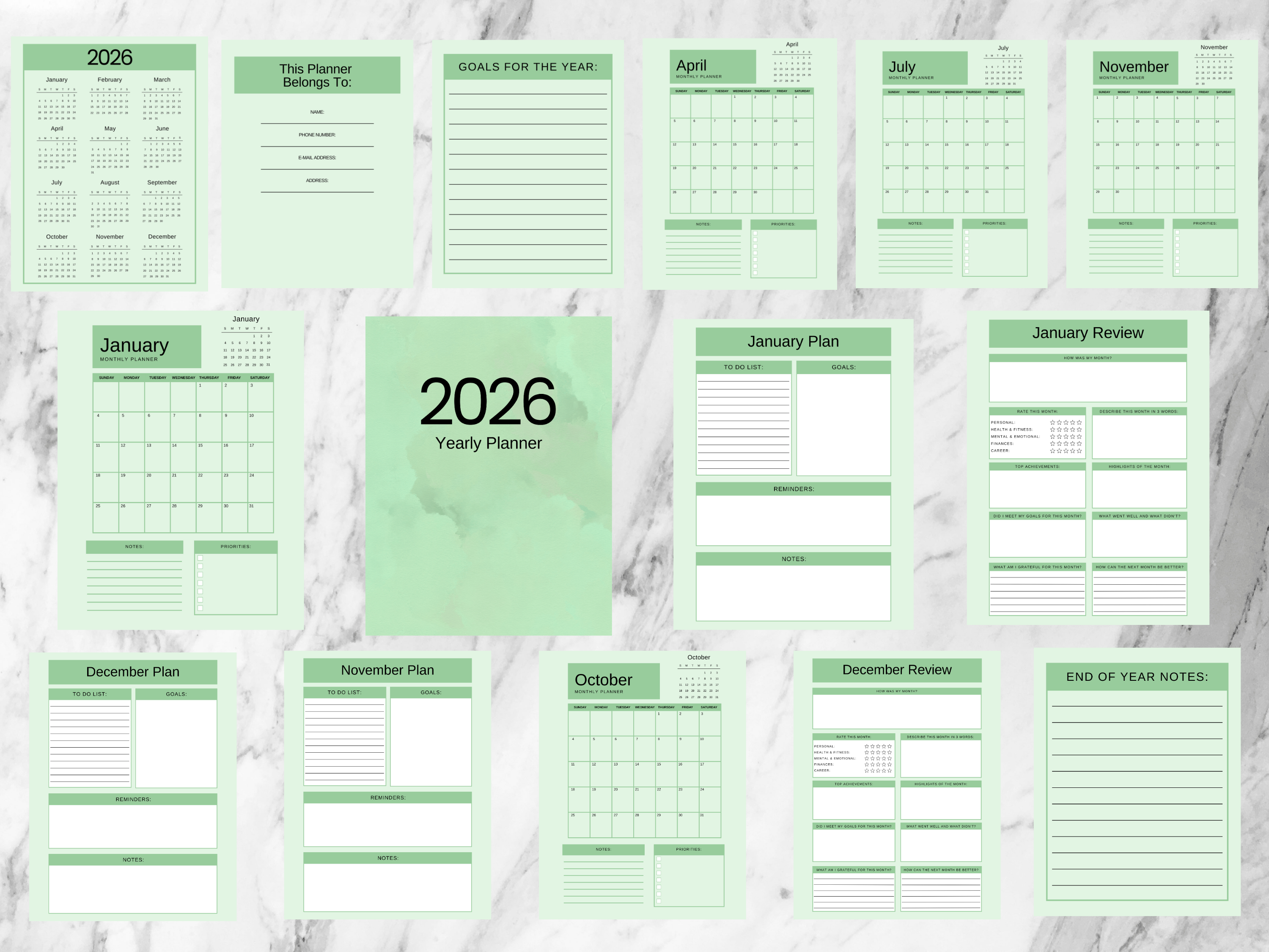 Collection of green planner pages for 2026 on a marble background