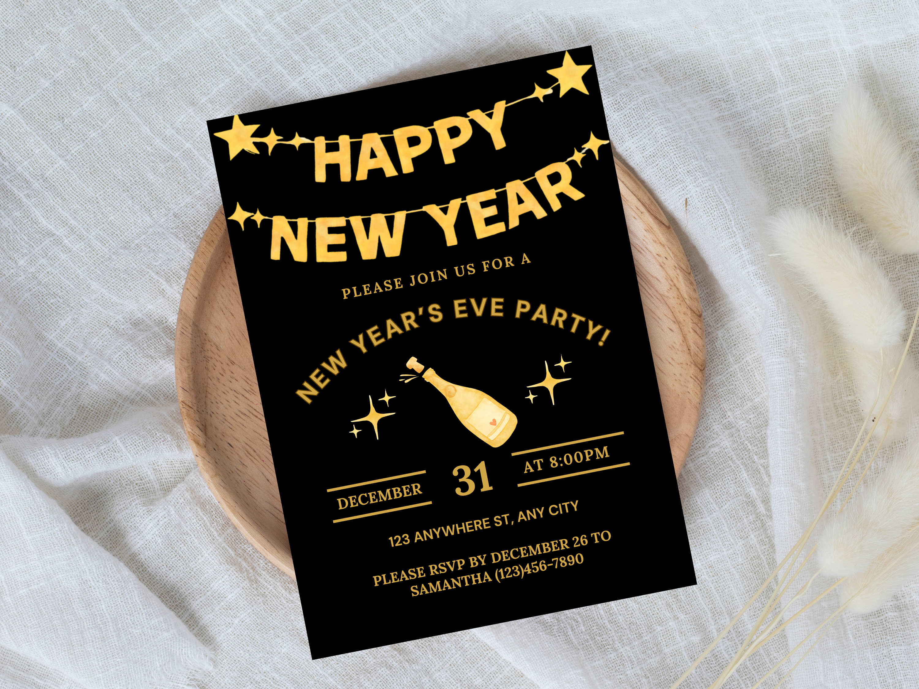 New Year's Eve party invitation card on a white fabric background