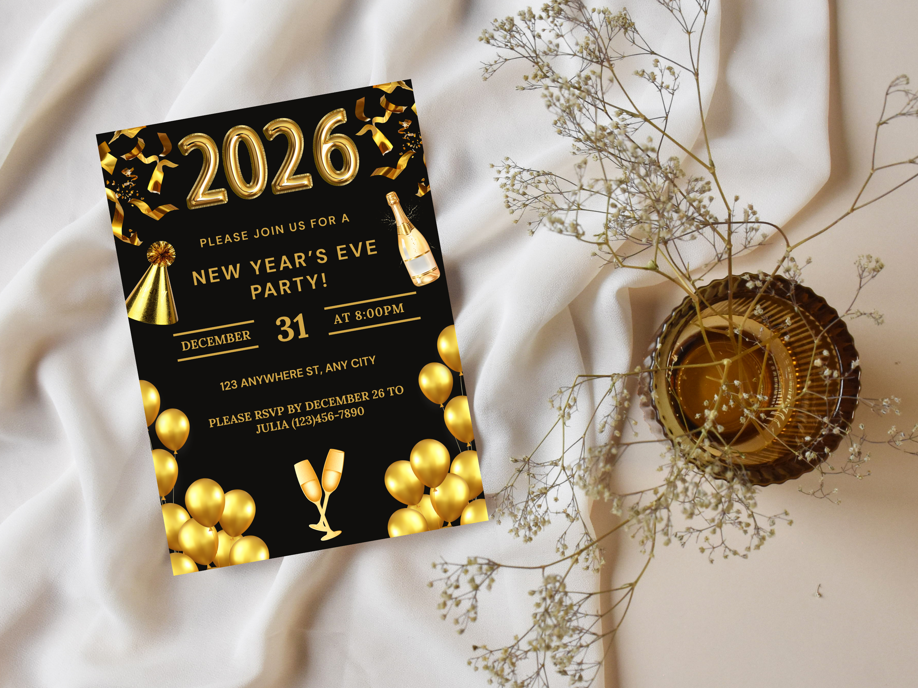New Year's Eve party invitation card with gold balloons and '2026' on a white fabric background.