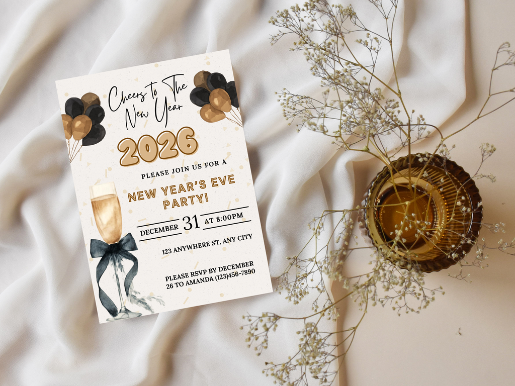New Year's Eve party invitation with champagne glass and balloons on a white fabric background